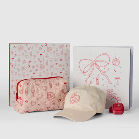 A set of gift items including a hat, pouch, and decorated books.
