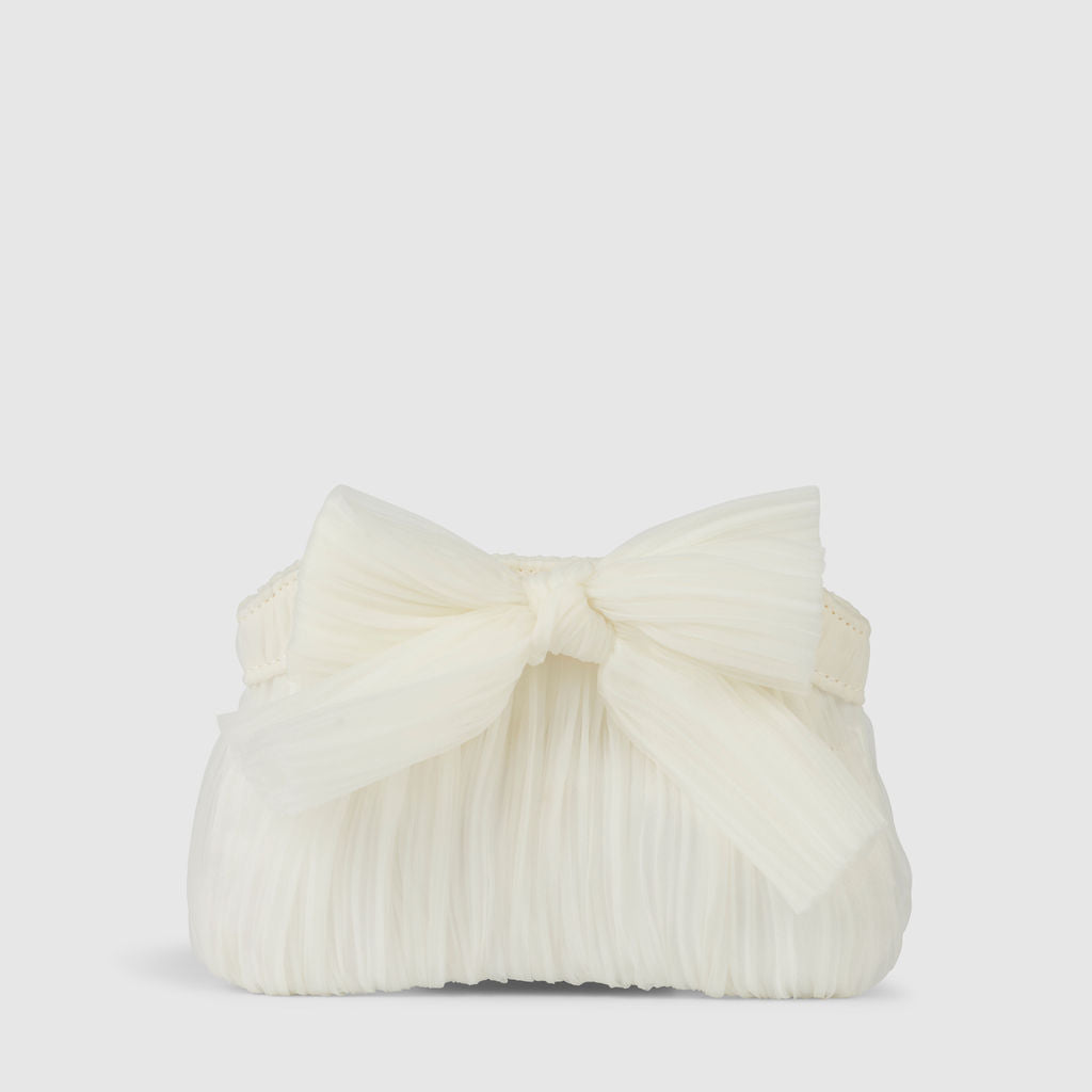 White pleated clutch bag featuring a stylish bow detail, perfect for a chic evening out.